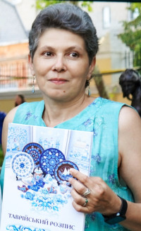 СВІТЛАНА РОМАНЕНКО